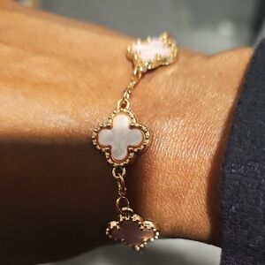 Elegant Gold and Pink Clover Bracelet